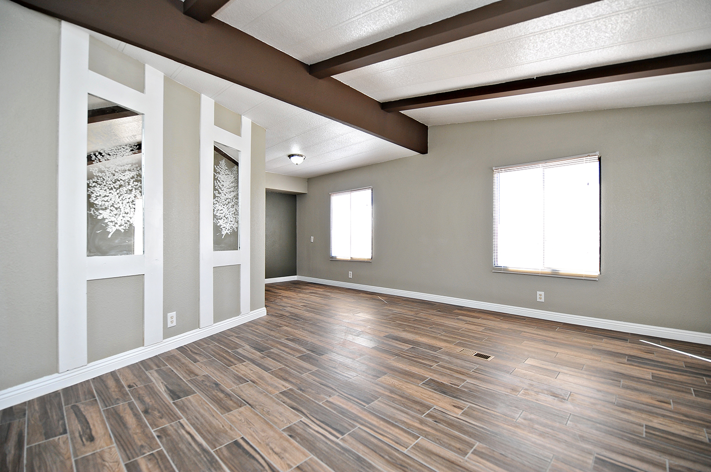 Great room renovation with marble accent wall
