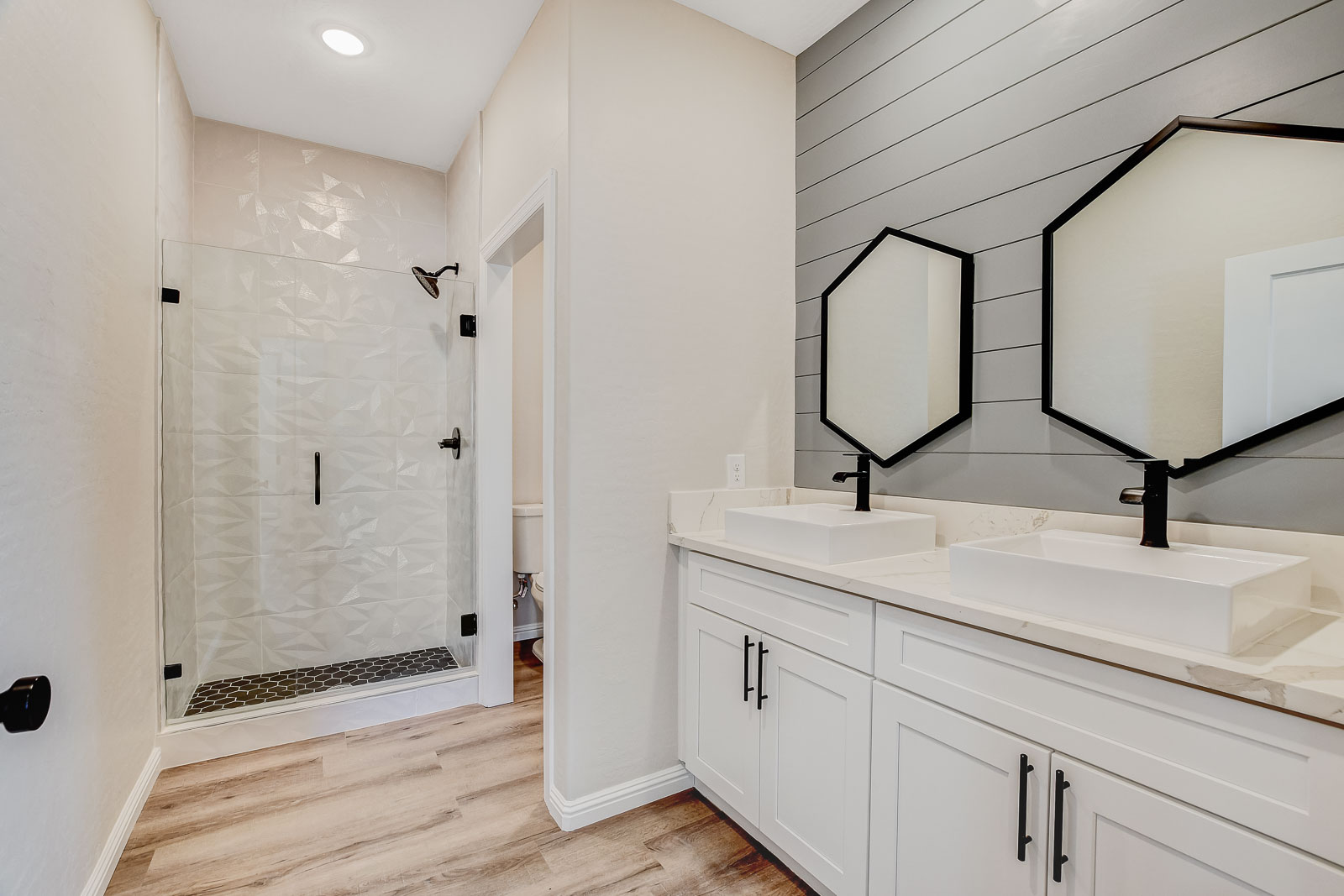 Renovated bathroom with double vanity