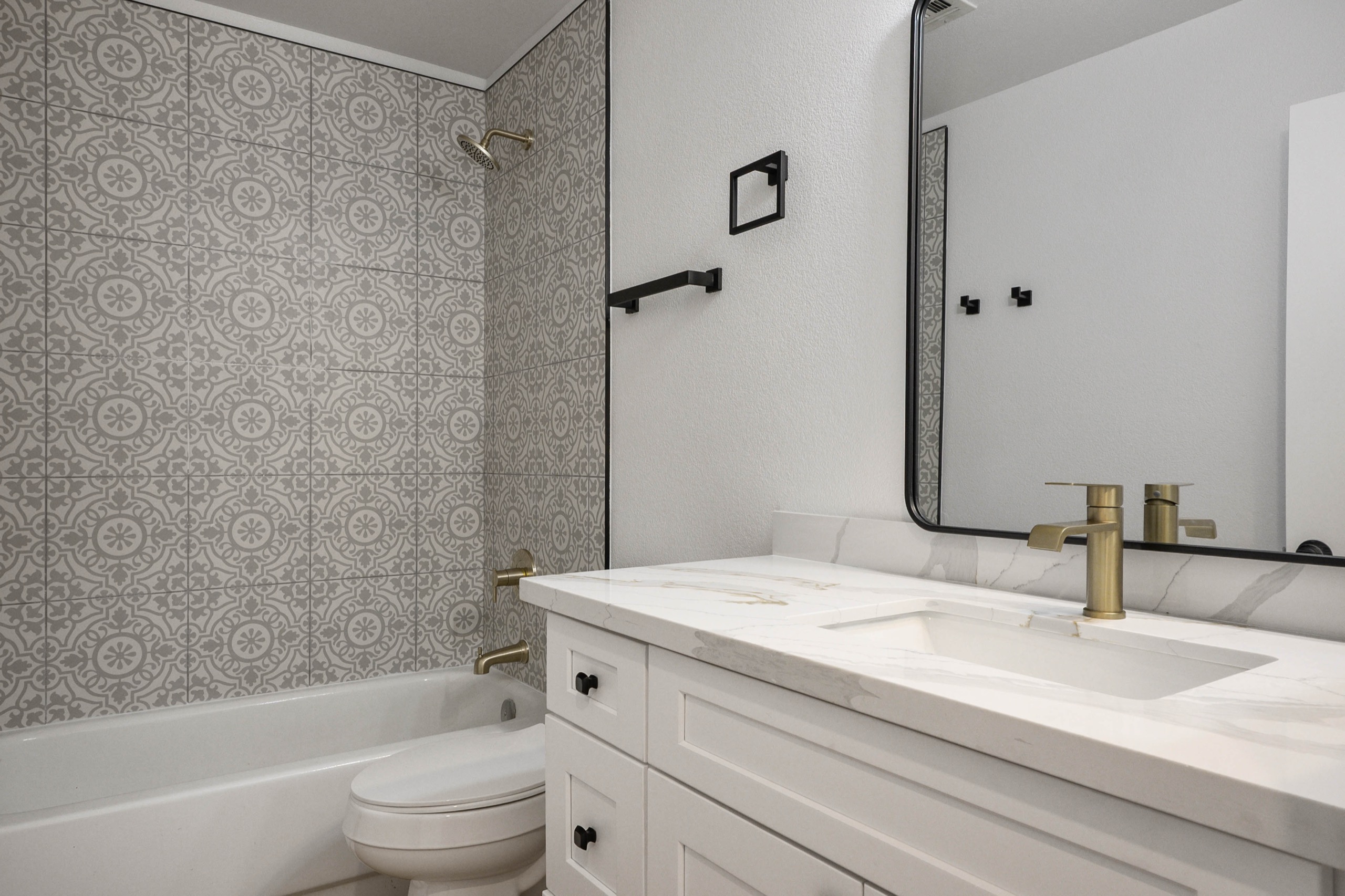 Bathroom renovation with patterned tile